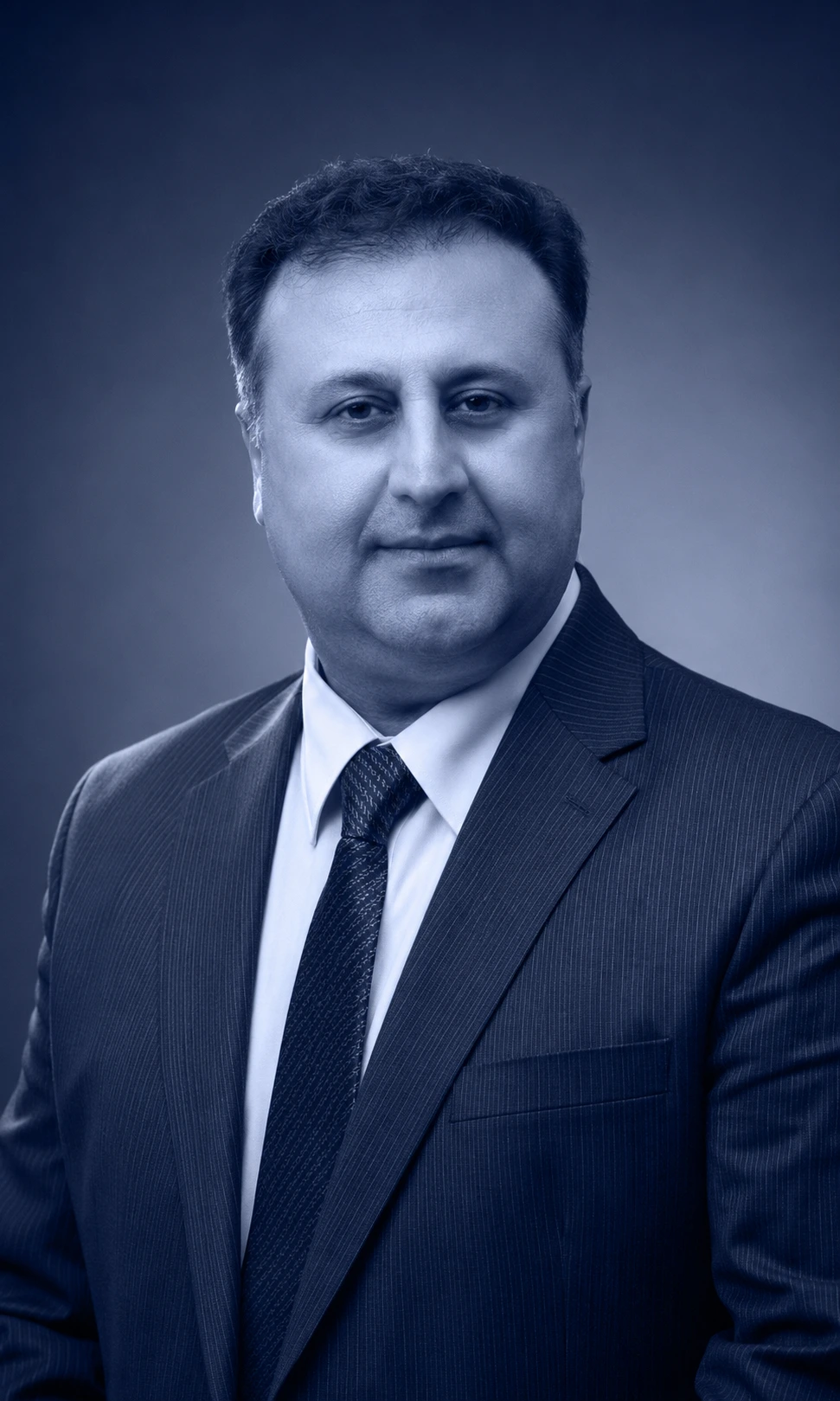 Studio portrait of Eng. Moghimi, Managing Director and CEO of Polyazin