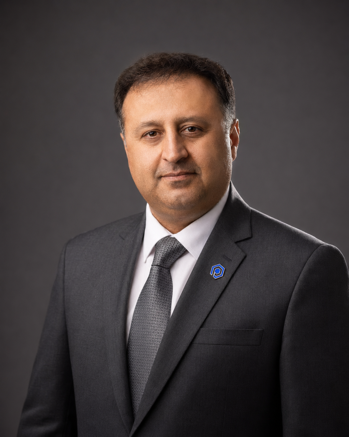 Studio portrait of Eng. Moghimi, Managing Director and CEO of Polyazin